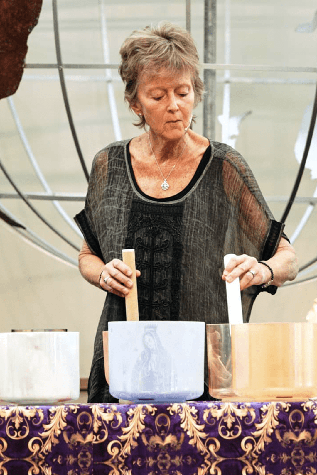 spiritual singing bowls being played