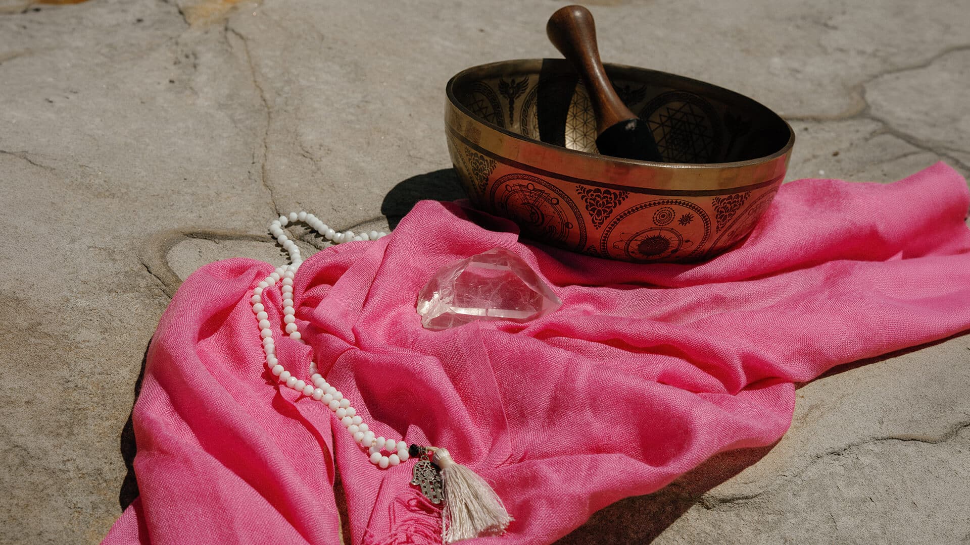 singing bowl and mala beads